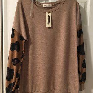 Ladies top by impressions boutique BN
